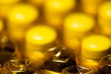 Yellow blister pack with pills is macro