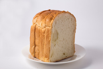 Slice of toasted bread on white background
