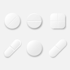 Set of white realistic medical pills. Round and oval tablets, painkillers, antibiotics, vitamins and aspirin. Medicine and drugs. Template design for medical and healthcare concept.