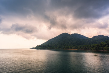 Sea and island with the rain cloud background