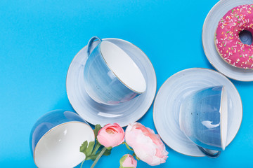 cups on a blue background top view