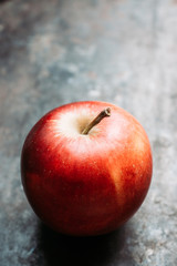 Close-up apples on the rustic wooden background. Selective focus. Shallow depth of field. 