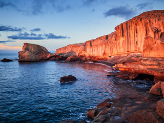 Rocky coast of San Miguel del Tajao of the southeast part of Tenerife at sunrise in the Spanish...