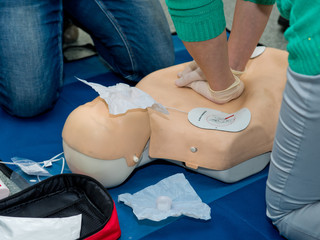 First aid cardiopulmonary resuscitation course using automated external defibrillator device, AED.
