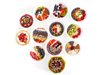 Healthy food on a white background. Smoothies with berries, fruits and nuts.