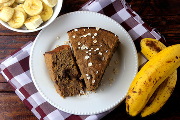 Healthy homemade banana cake made with oatmeal on rustic wooden table. sugar-free, milk-free, gluten-free