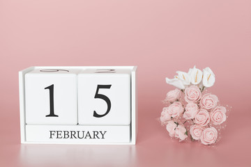 February 15th. Day 15 of month. Calendar cube on modern pink background, concept of bussines and an importent event.