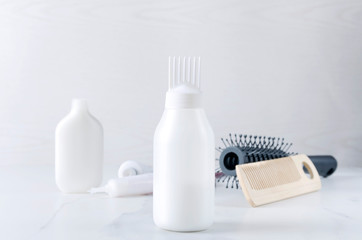 Hairdresser products for hair care at the salon.Plastic bottles with professional liquids for dye hair