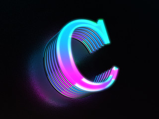 Beautiful colored glass letter C glowing in the dark © concept w