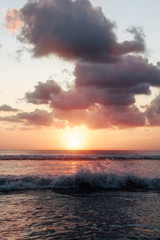 Naklejka na ściany i meble Beautiful sunset on the beach
