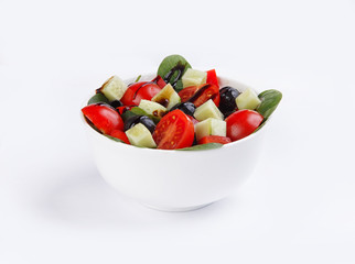 vegetable salad in a plate on a white background