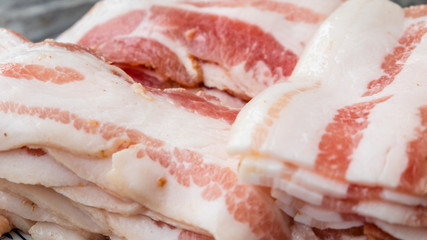 Rashers of bacon on plate