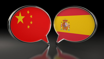 China and Spain flags with Speech Bubbles. 3D Illustration