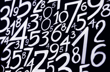 Background of numbers. from zero to nine. Numbers texture. Currency symbols. Numerology. Mathematical equations and formulas