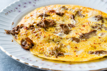 Omelette with Meat Kavurma for Turkish Breakfast.