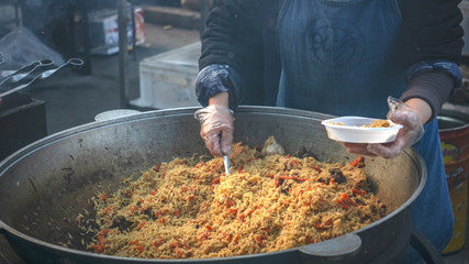 cooking a pilaf. street food.