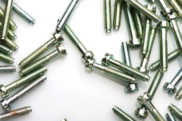 small bolts on a white background. the bolts