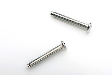 small bolts on a white background. the bolts