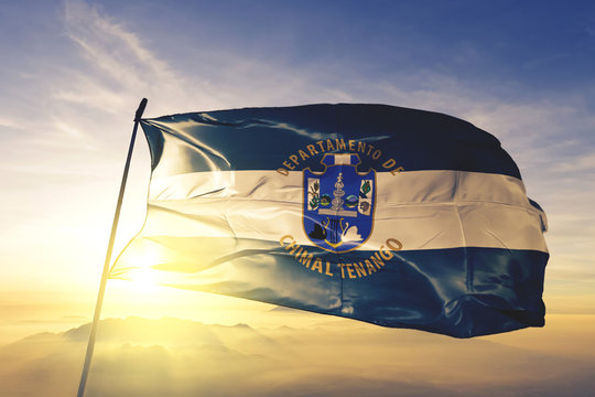 Chimaltenango department of Guatemala flag waving on the top sunrise mist fog