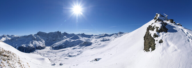 Savognin: region, snow-covered mountains and ski slopes