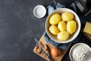 Ingredients for cooking Italian cuisine gnocchi - boiled potatoes, flour, egg and salt.