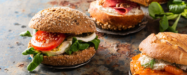 Italian Caprese sandwiches with fresh tomatoes, mozzarella cheese