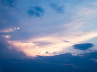 Naklejka na ściany i meble Beautiful blue sunset sky. Cloud like a flying dragon