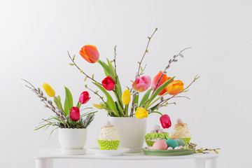 Easter arrangement with tulips and cupcakes