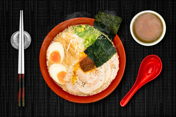 Ramen are Japanese noodles. They consist of wheat noodles served in a pork broth. often flavored with miso, uses toppings such as sliced pork (chasyu), dried seaweed and bamboo shoots ( menma).
