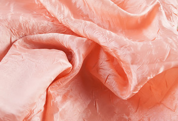 Living Coral color soft chiffon fabric texture. Living Coral Color 2019 year concept. tulle fabric...