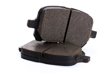 Set of brake pads, car spares isolated on white background