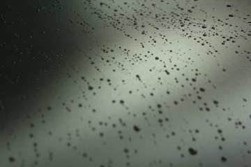 Water / rain drops on grey surface. Abstract background