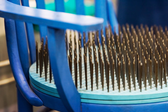 Chair with nails on the seat