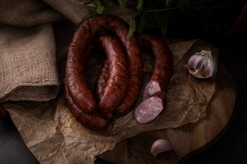 Smoked sausage. Traditional natural sausage, homely sausage
