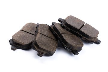 Set of brake pads, car spares isolated on white background