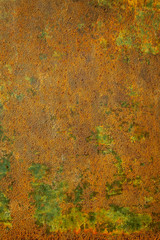  Old metal wall painted green and golden color for background use.