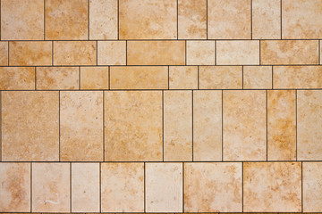 Naklejka premium New modern ventilated stone wall made with different blocks of rectangular shape with wide joints
