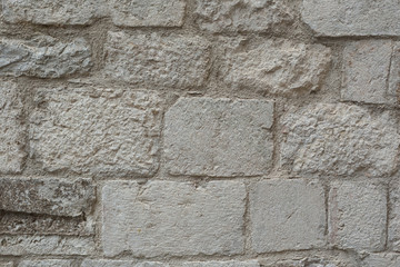 pattern gray color of modern style design decorative uneven cracked real stone wall surface with cement