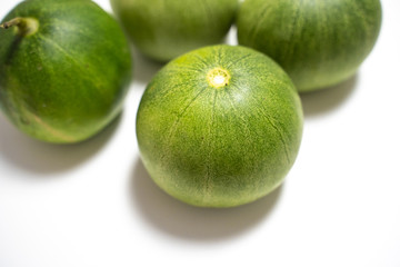 Green delicious melon isolated in white back ground looking yummy