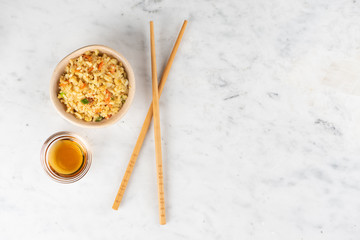 Fried Rice with vegetables and sauce on a plate \ in a bowl