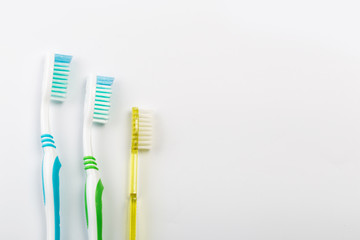 New different  toothbrushes on a white background