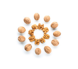 Tasty walnuts on white background