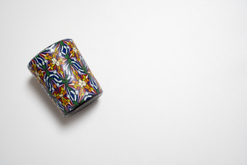 Mosaic candle cup isolated in white background