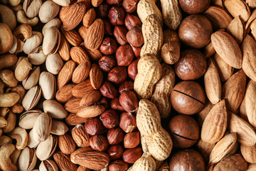 Different tasty nuts, closeup