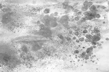 Gray acrylic background on white paper. Paint leaks and ombre effects.	