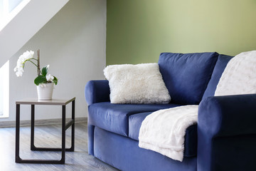 Interior of room with sofa and table