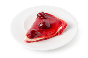 Strawberry cheesecake over a white plate isolated on white background