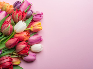 Colorful bouquet of tulips on white background.