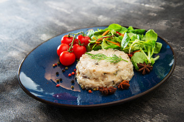 risotto with fresh cream, salted chicken, rehydrated ceps and mushrooms.chicken and mushroom risotto