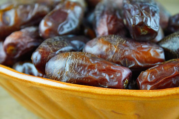 sweet algerian arabic dates fruits on a plate